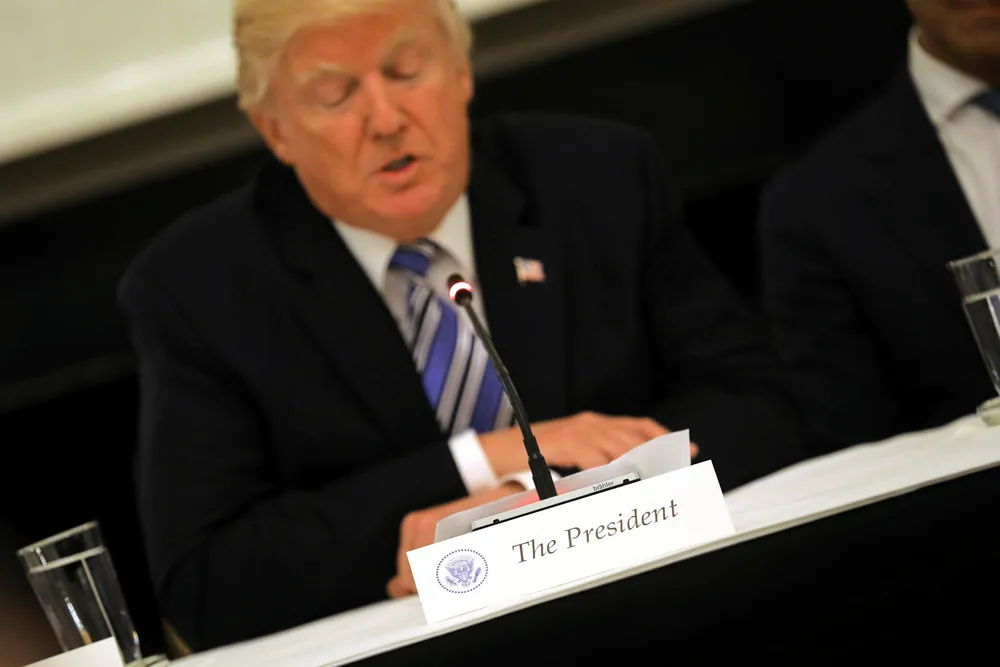 Kritikken og motstanden mot president Donald Trump vil øke dersom republikanerne taper tirsdagens valg i Georgia. Foto: Carlos Barria/Reuters/NTB Scanpix