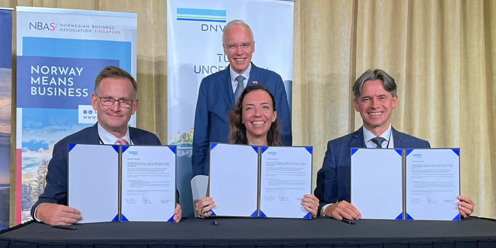 Front, from left: Odfjell chairman Laurence Odfjell; Cristina Saenz de Santa Maria, maritime regional manager of DNV in Asia; and Bernt Skeie, CEO of Alma Clean Power. Back: Eivind Homme, Norway’s ambassador to Singapore.