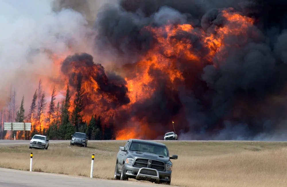 Devastation: Fort McMurray residents flee one of the worst fire's in Alberta's history