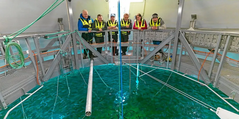 Key executives behind The Egg closed containment salmon farm as the first smolt are put in the water.