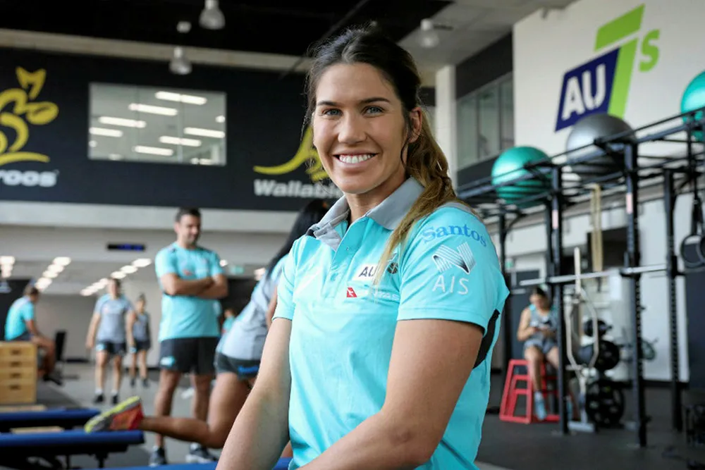Qantas Australian Women’s Sevens player Charlotte Caslick sports a shirt with the Santos sponsor logo