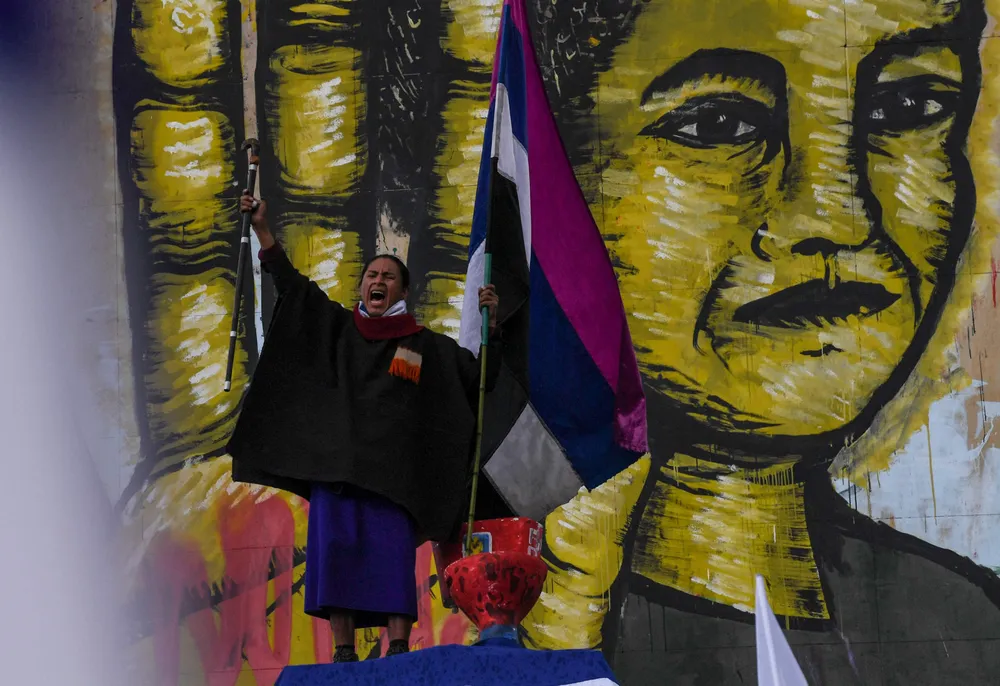 Anger: an indigenous man shouts slogans during a demonstration against the government of Colombian President Ivan Duque outside the Congress building in Bogota