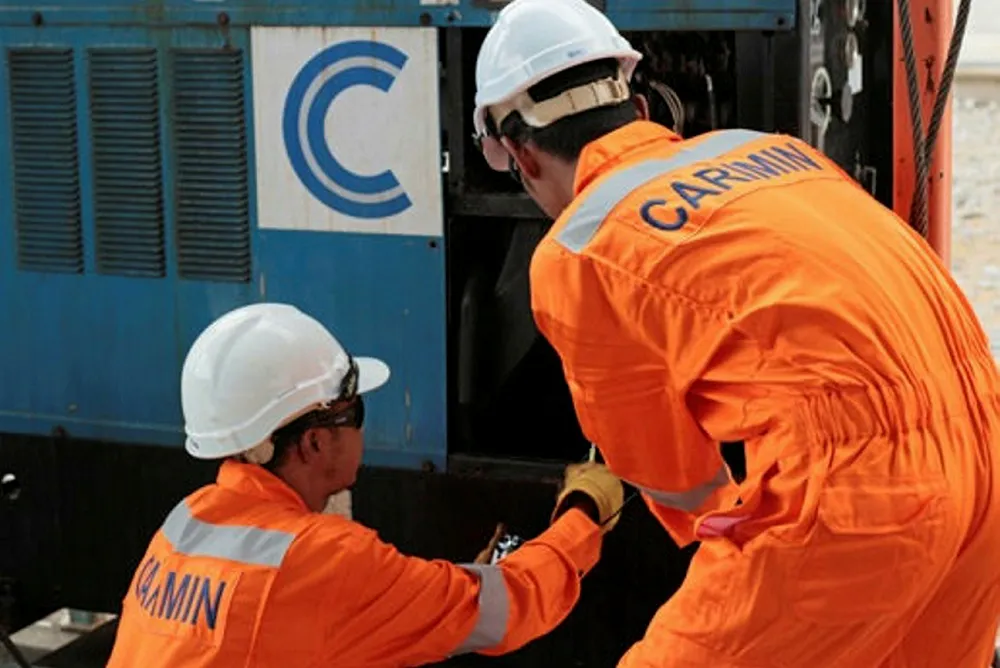 Busy at work: Carimin employees