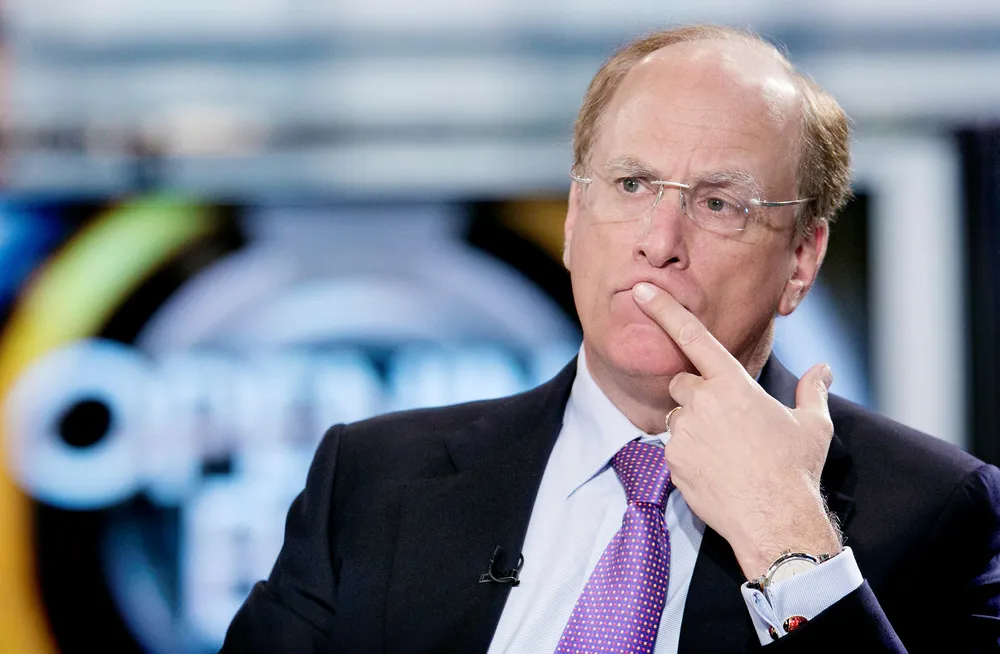 Toppsjef Larry Fink og hedgefondet Blackrock gir seg ikke i troen på nedtur for Norwegian-aksjen. Foto: Mark Lennihan/AP/NTB Scanpix
