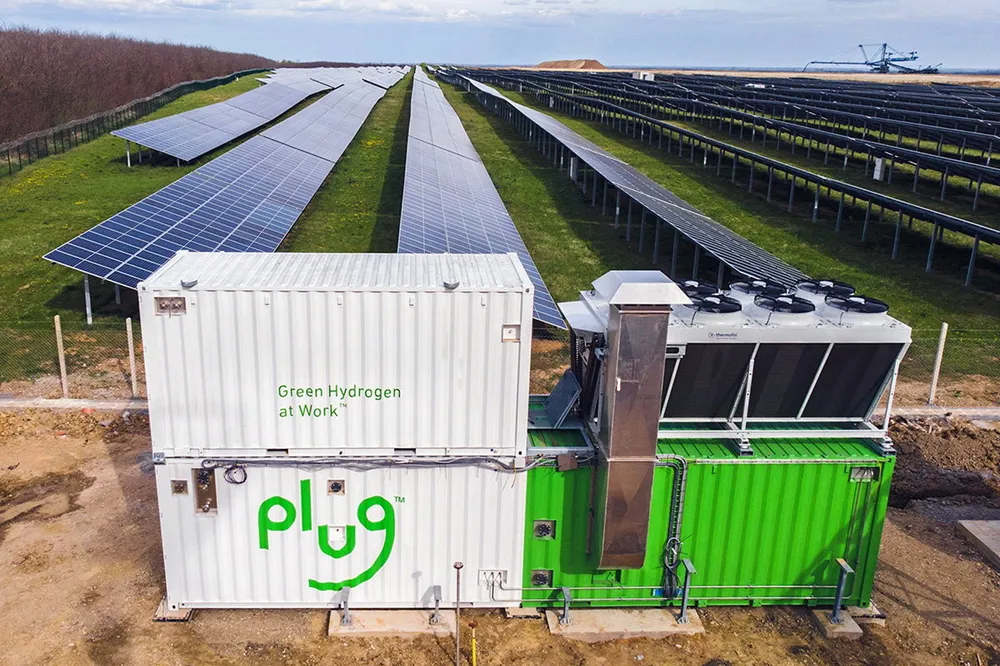 A Plug electrolysis system installed next to a solar farm.