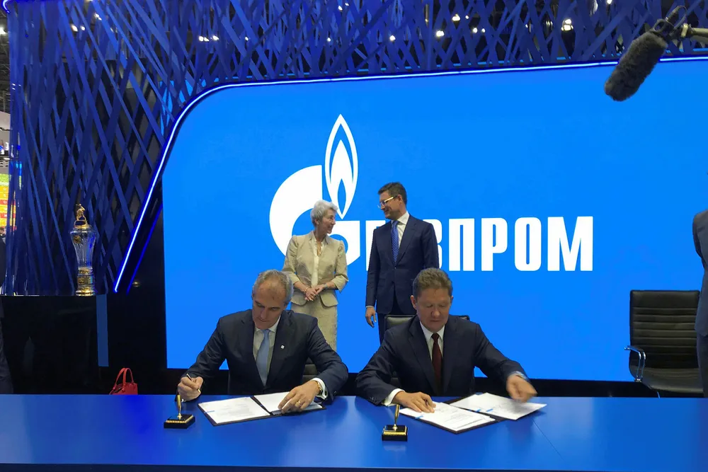 Deals: OMV chairman Rainer Seele (left) and Gazprom chairman Alexei Miller signing an LNG deal at the St Petersburg International Economic Forum