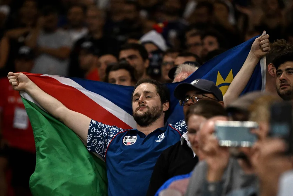 A Namibian supporter holds a national flag at the Rugby World Cup in France in 2023.