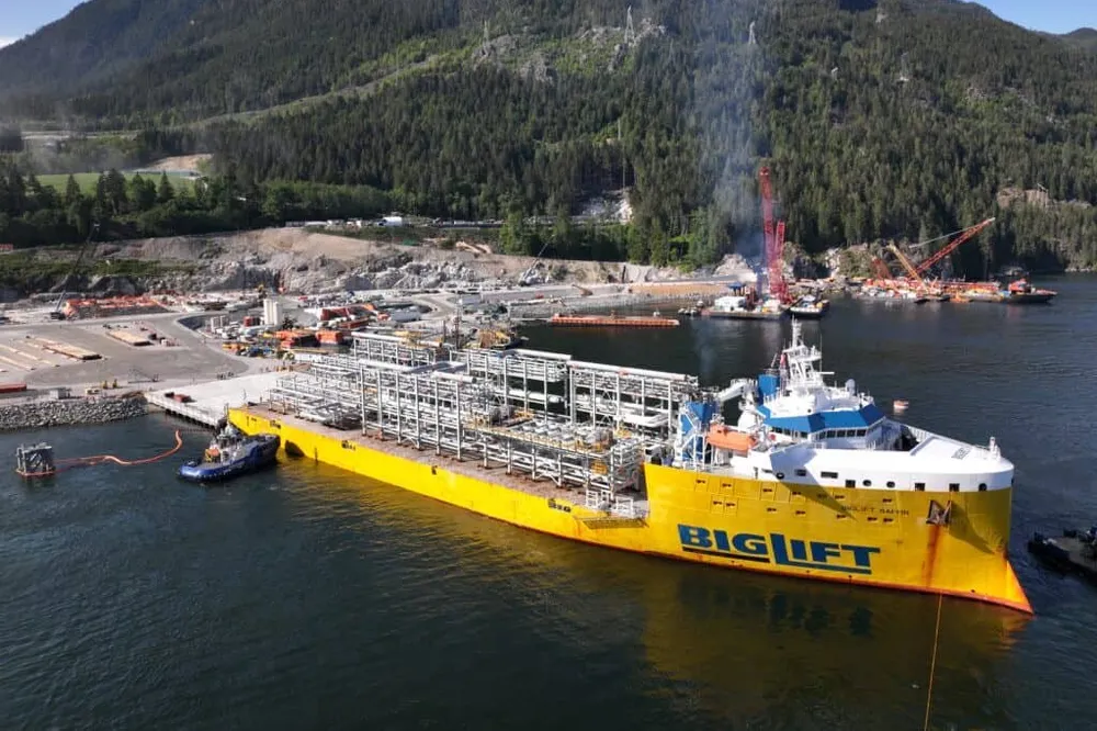 A vessel carrying pipe rack modules for Woodfibre LNG arrives at the construction site for the liquefied natural gas export project in British Columbia.