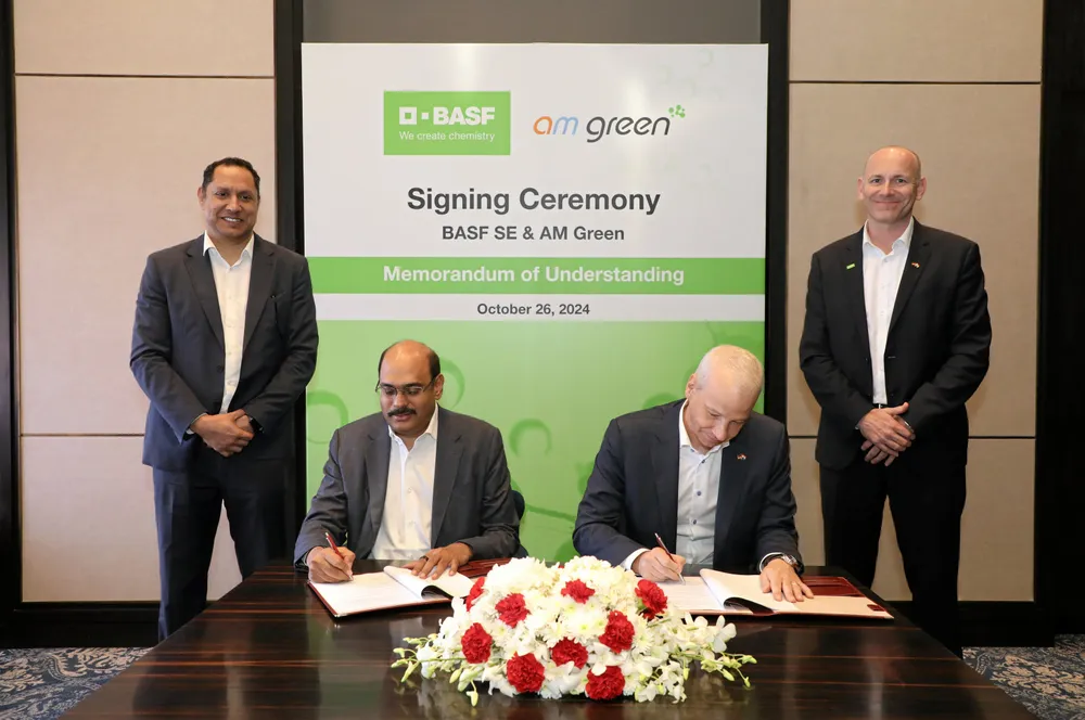 The signing ceremony in October 2024 where BASF agreed to buy 100,000 tonnes of ammonia per year from AM Green's 1.3GW green hydrogen and ammonia complex in Kakinada, India. AM Green has taken a final investment decision to build the facility, but the deal with BASF is only a non-binding memorandum of understanding. The Indian developer has also reserved offtake capacity for Yara, Uniper and RWE for the same project.