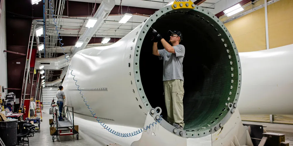 A worker installs components at the Siemens Gamesa plant in Fort Madison, Iowa.