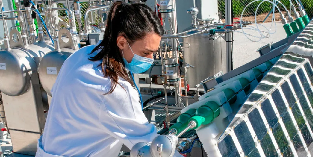 Scientist works on photoelectrocatalysis demo at Repsol research lab