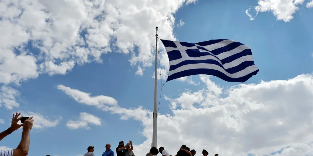 Greek flag atop the Acropolis archaeological site