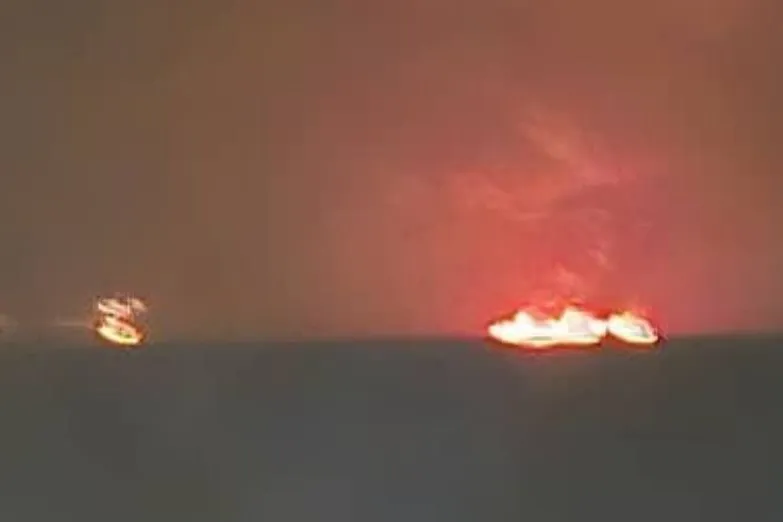 An image from a social media post claiming to show tankers ablaze in the Gulf of Oman.