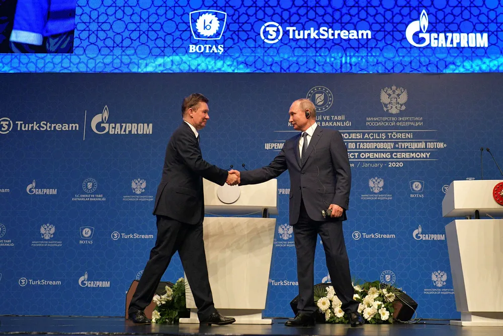 Collateral damage: Russian President Vladimir Putin (right) and Gazprom chairman Alexei Miller shake hands at an inauguration ceremony of subsea gas export pipeline TurkStream in January 2020