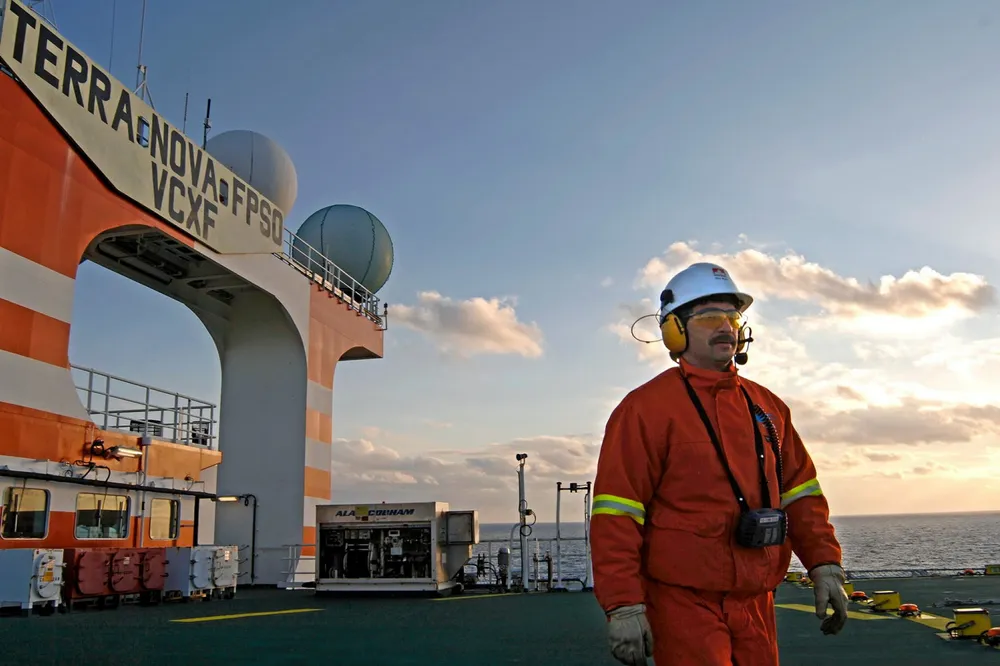 Revived: A worker on the helideck of Suncor Energy's Terra Nova FPSO which — now upgraded — has restarted production offshore Newfoundland, Canada.