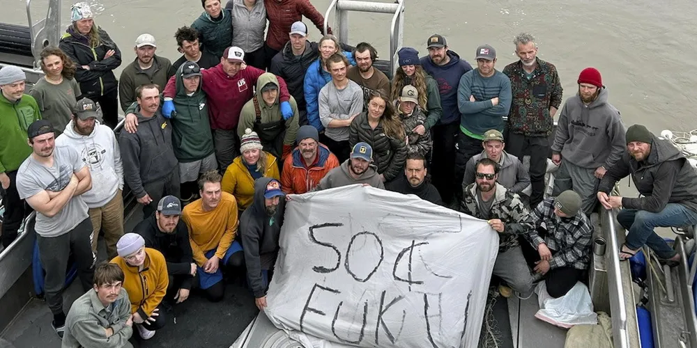 A Bristol Bay radio group protests low prices offered by processors in the Naknek River on July 20, 2023.
