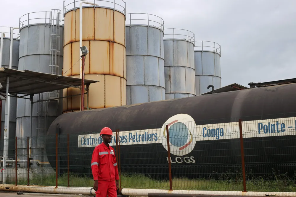 Nearby: a worker at an industrial complex in Pointe Noire, Congo-Brazzaville, close to NewAge's proposed Nene Extension project