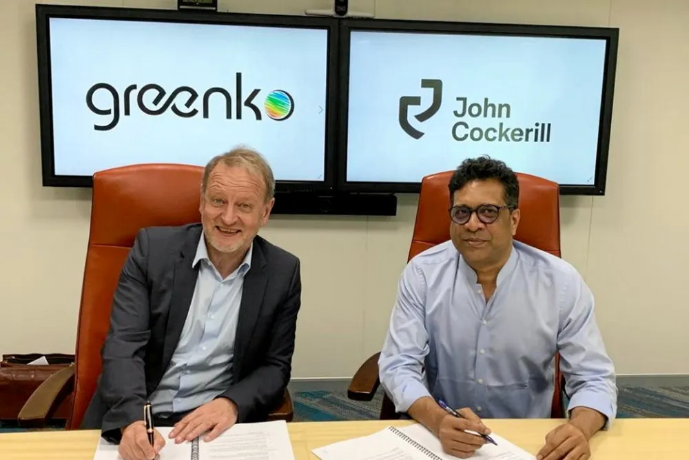 John Cockerill CEO Jean-Luc Marangue and Greenko boss Anil Chalamalasetty sign their partnership deal in Hyderabad, India.