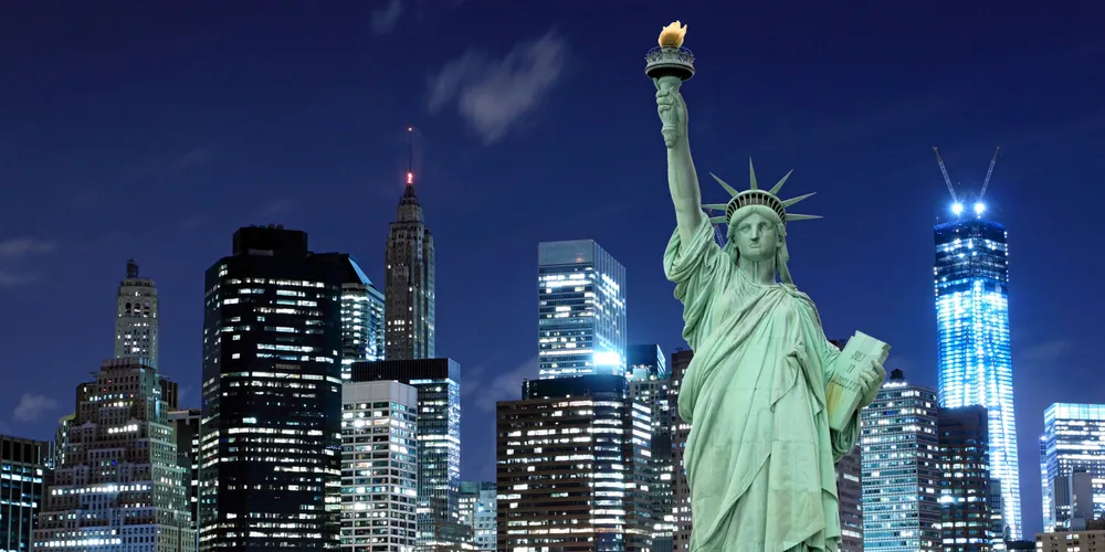 Manhattan Skyline and The Statue of Liberty at Night, New York City . NYC.