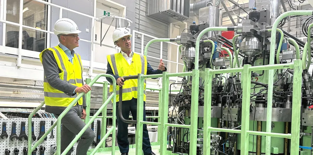 MAN Energy Solutions chief executive Uwe Lauber (right), seen here showing the company’s test engine to his counterpart at AP Moller-Maersk Vincent Clerc, has said the company’s two-stroke ammonia engine will likely be commercially available from 2027. Photo: Vincent Clerc