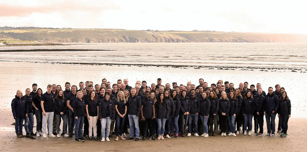 Cork, Ireland-based blue economy developer Simply Blue employees on the water's edge