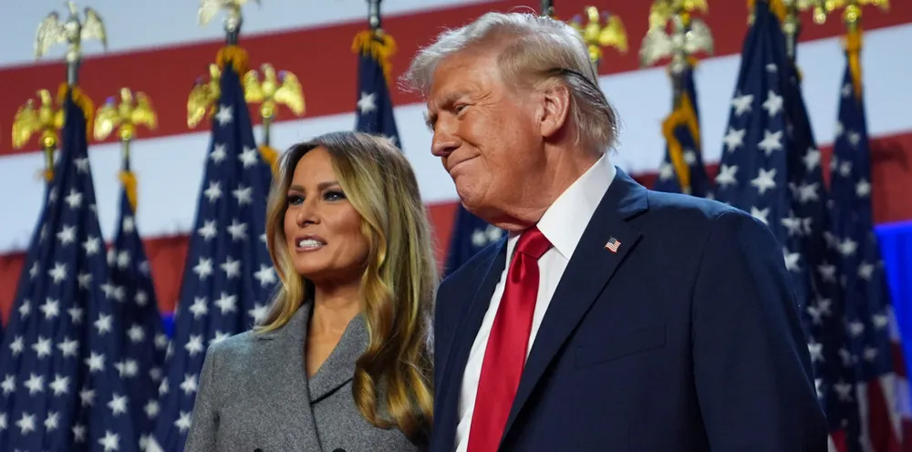 Republican presidential nominee former president Donald Trump stands with former first lady Melania Trump at an election night.