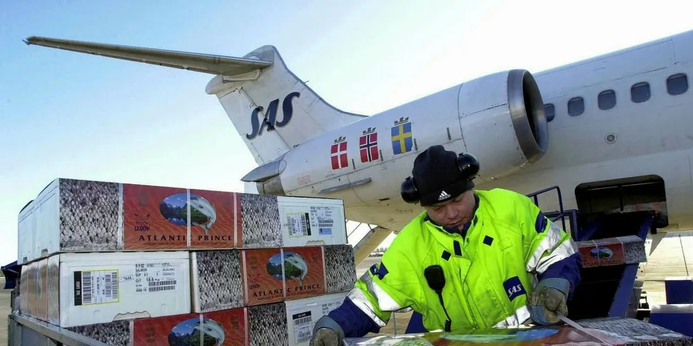 Fiskeeksport fra Norge til utlandet en tidlig morgen på Gardermoen. En stor del av eksportvektsten for norsk sjømat kan takkes svak norsk krone.Arkivfoto: Per Ståle Bugjerde
