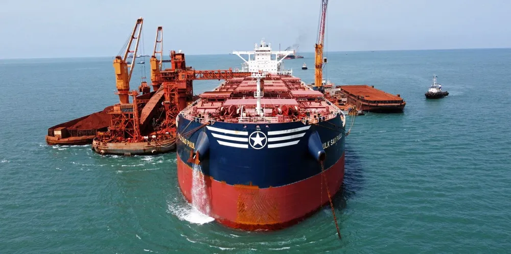 A capesize bulker loads bauxite in Port De Boke, Guinea.