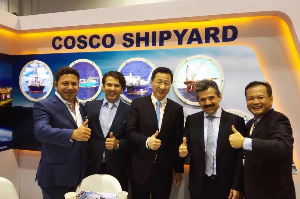 Collaboration: Cosco president Liang Yanfeng (centre) works with rig owners to weather storm