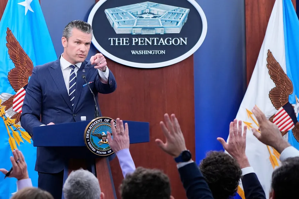 US Defence Secretary Pete Hegseth calls on reporters for questions during a news conference at the Pentagon in Washington, Sunday, 22 June 2025, after the US military struck three sites in Iran, directly joining Israel's effort to destroy the country's nuclear program.