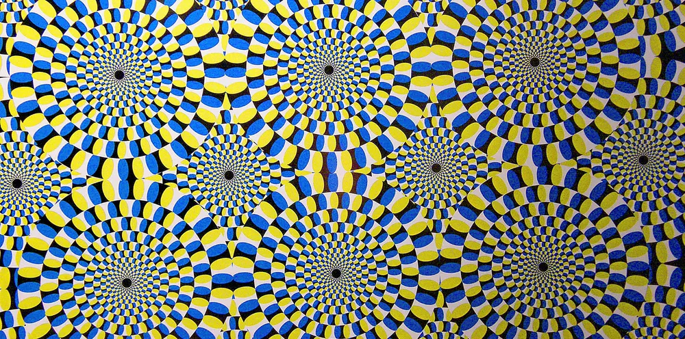 As you move your eyes around this still image, the circles seem to rotate.