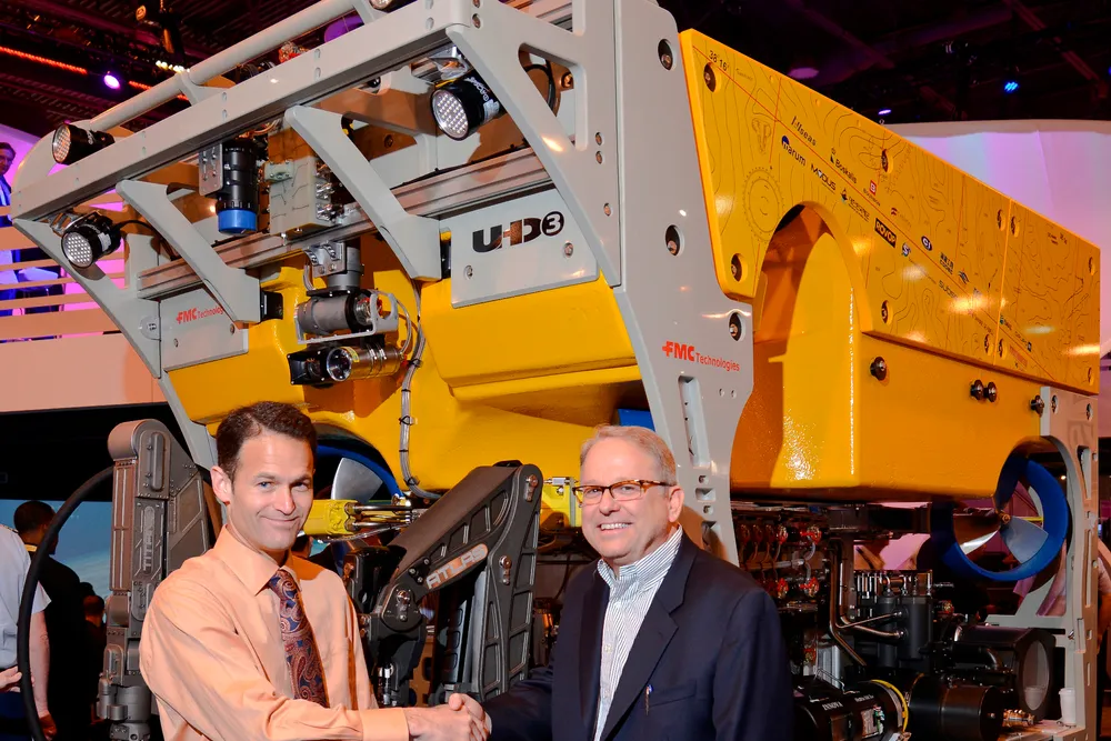 ROV deals: C-Innovation's Damon Chouest (L) and FMC's Tyler Schilling (R) in front of UHD-III ROV