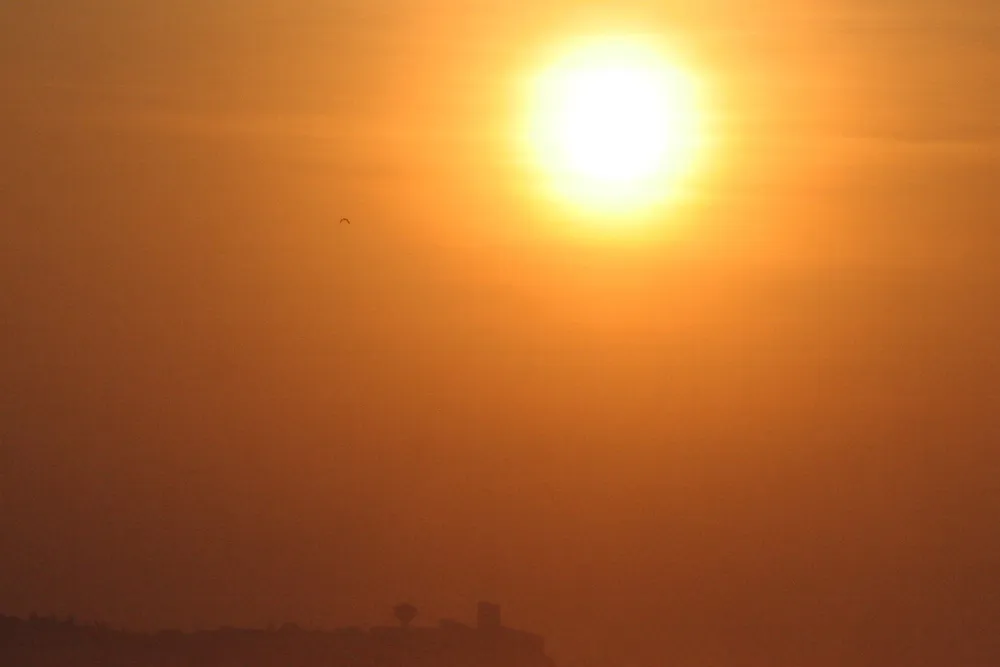 End of the day: fishermen at sunset in Chorkor, near Ghana's capital Accra.