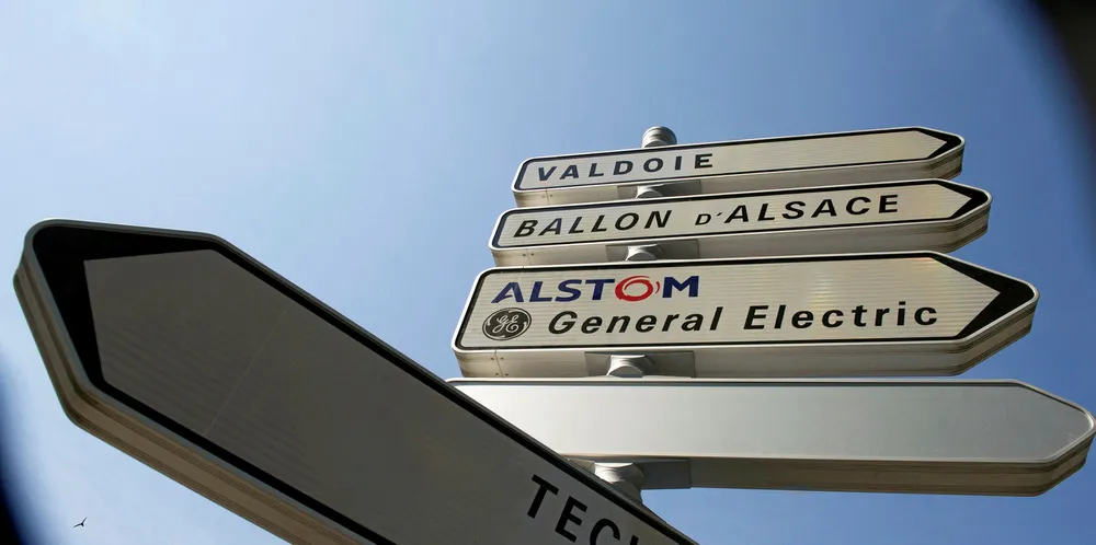 A photo taken in Belfort shows road signs indicating directions for deliveries to French power and transport engineering company Alstom and US conglomerate General Electric (GE).