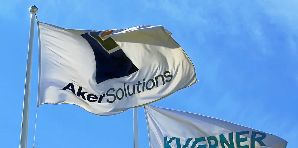 Aker Solutions and Kvaerner flags flutter next to their headquarters in Fornebu, Norway.