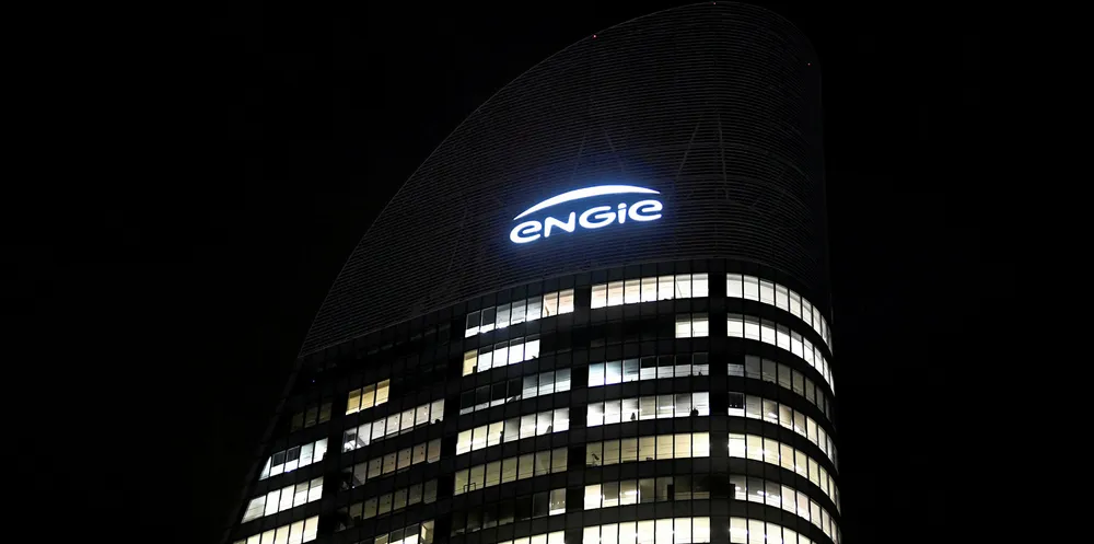 A picture taken on the esplanade of the business district of La Defense, west of Paris, on November 28, 2017 shows a logo of Engie on the company headquarters' tower.