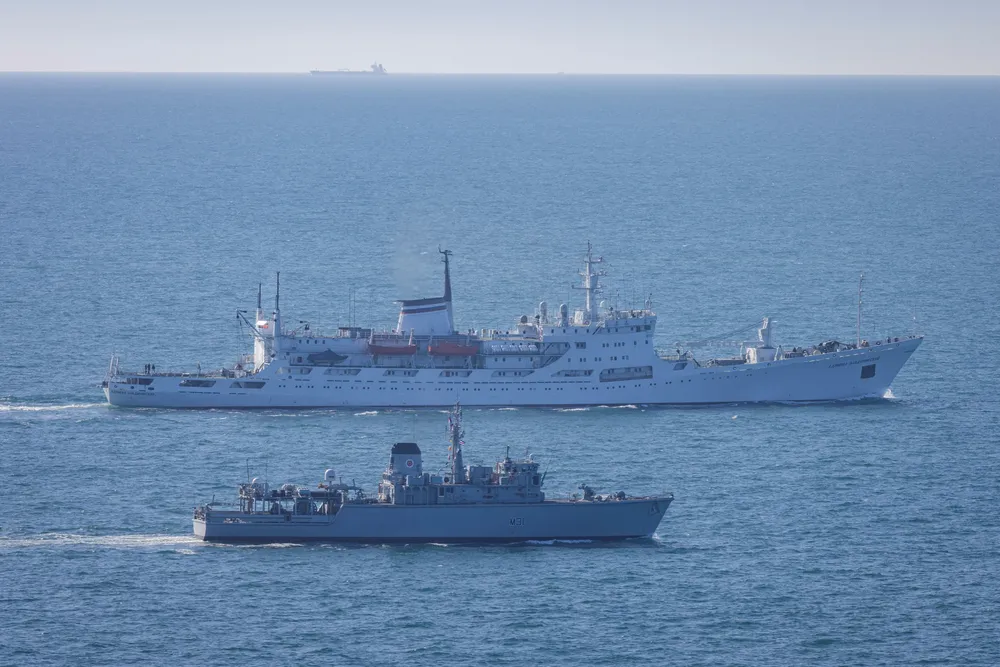 HMS Cattistock shadows the Russian ship Admiral Vladimirsky transiting in the English Channel, in March.