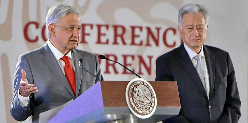 Mexico's president AMLO (left) and Manuel Bartlett, general director of CFE, talk about plans for the country's power industry.