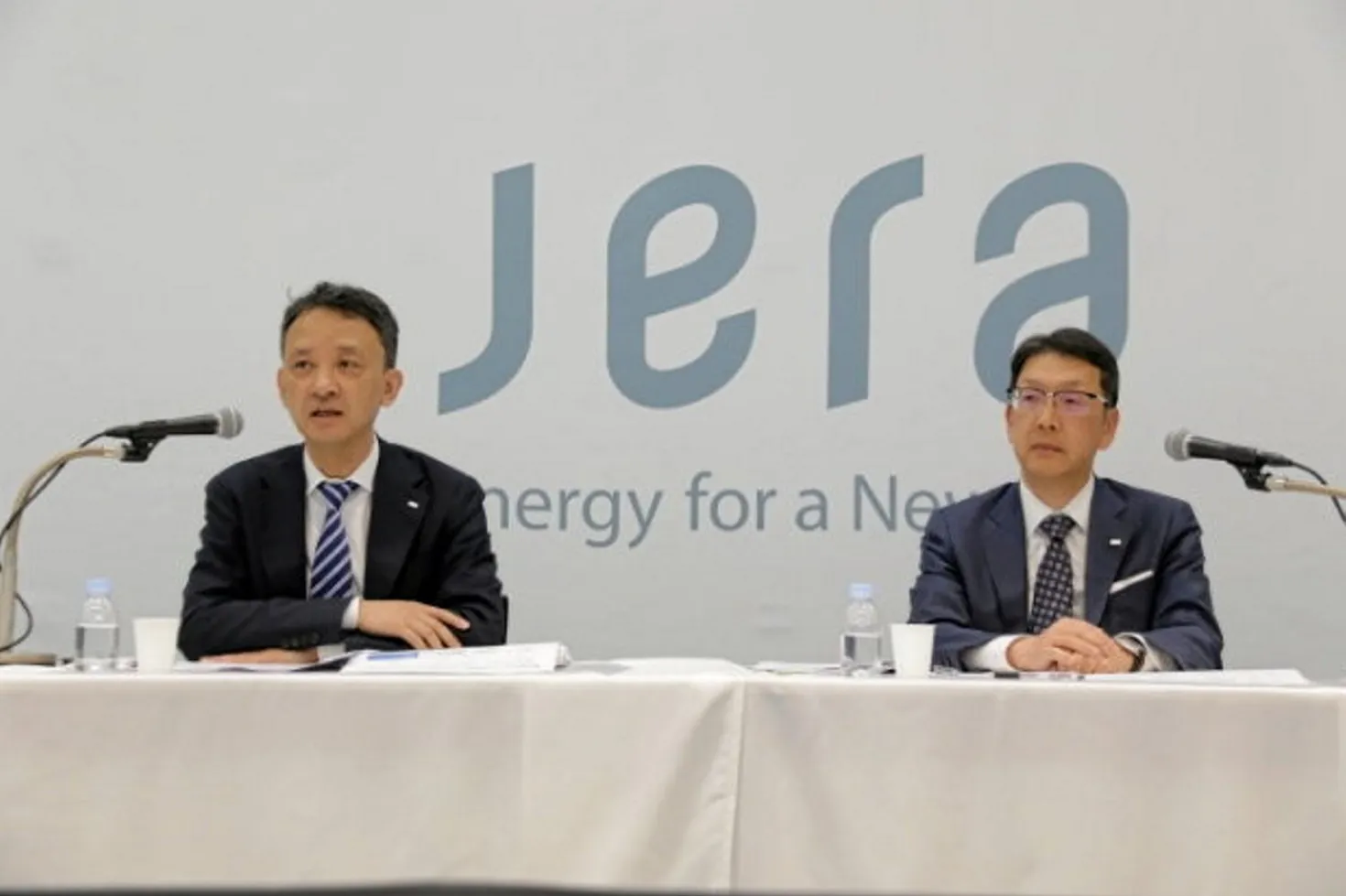 Yukio Kani, global CEO and chair (left), and Hisahide Okuda, president, director, CEO and COO (right) for JERA at a press conference.
