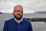 Carl-Erik Arnesen er styreleder i Troland Lakseoppdrett.