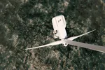 Two offshore workers on the top of the windmill, wind farm, 3D rendering . Offshore wind.