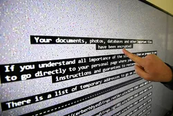 Screen hacker viruses at the LHS High Security Laboratory of the INRIA (National Institute for Research in Computer Science and Automation) in Rennes, France.