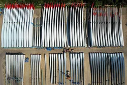 Wind turbine blades stacked at a fabrication plant in Lianyungang, China